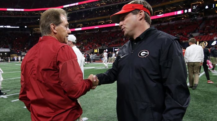 Jan 8, 2018; Atlanta, GA, USA; Alabama Crimson Tide head coach Nick Saban shakes hands with Georgia Bulldogs head coach Kirby Smart before the 2018 CFP national championship college football game at Mercedes-Benz Stadium.